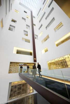 Entrance to the hotel with golden windows 