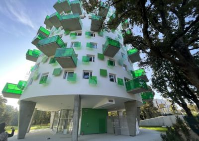 residential building with green balconies