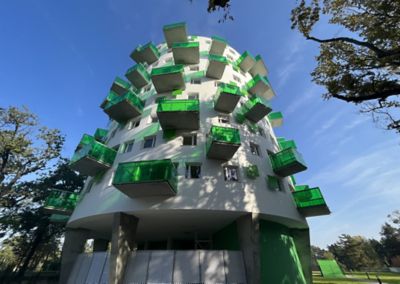 residential building with green balconies