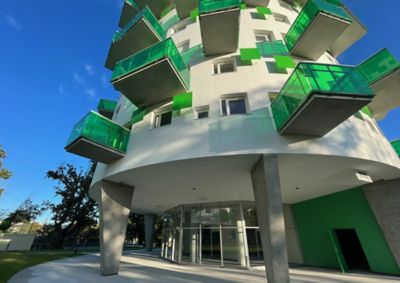 residential building with green balconies