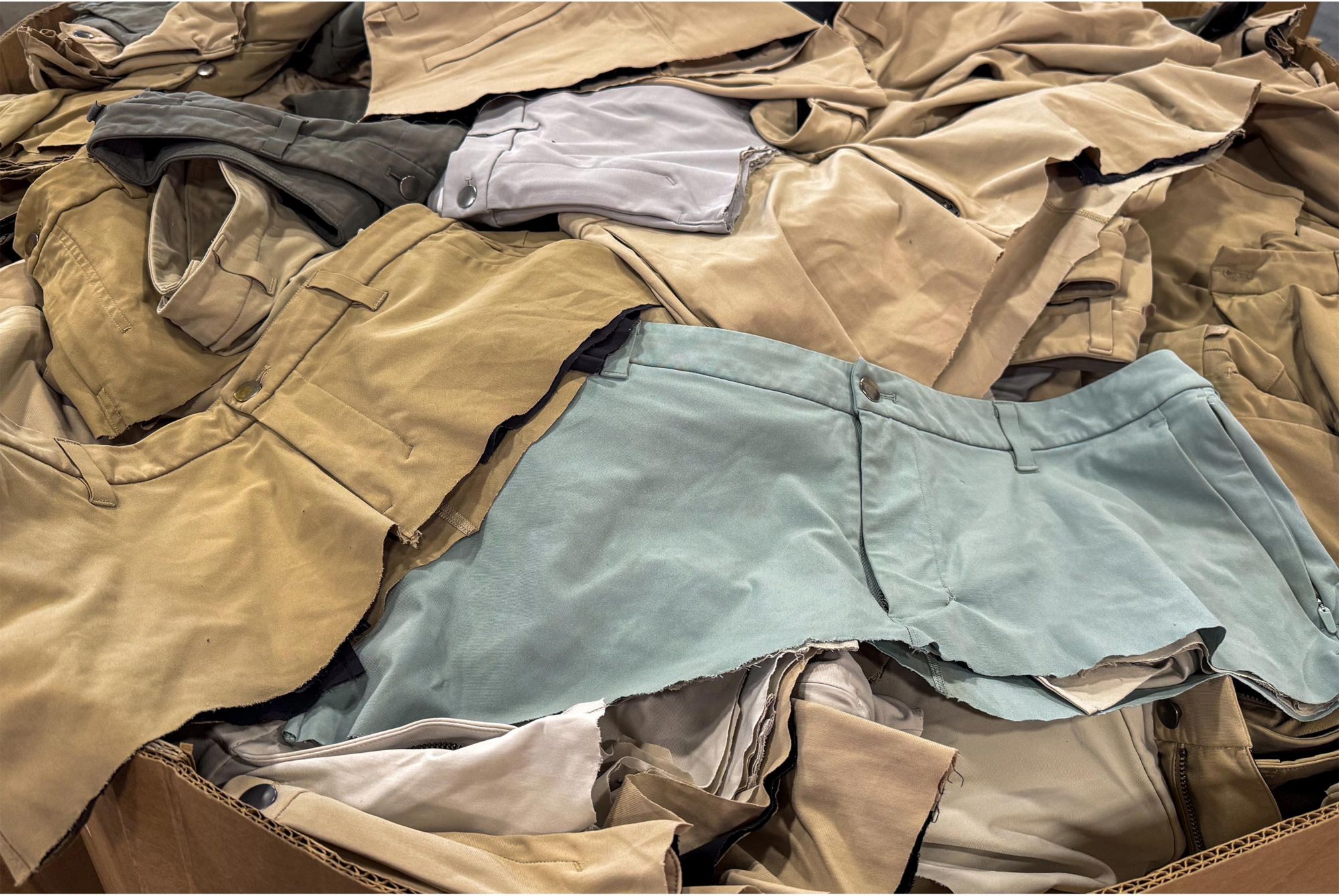 Discarded pants in a pile for recycling 