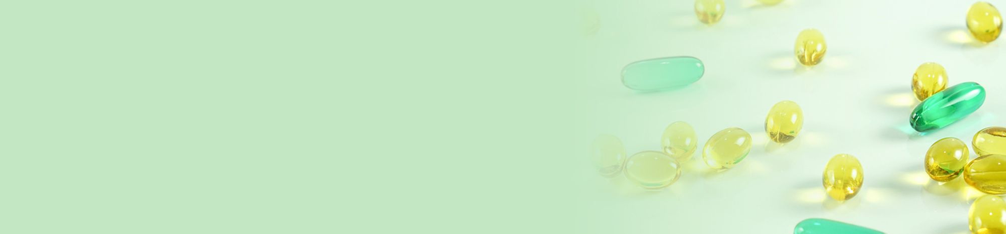 Yellow and green soft gelatin pills 