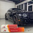 Bentley Flying Spur noire en atelier pour pose de pellicule pour fenêtres LLumar ATR  