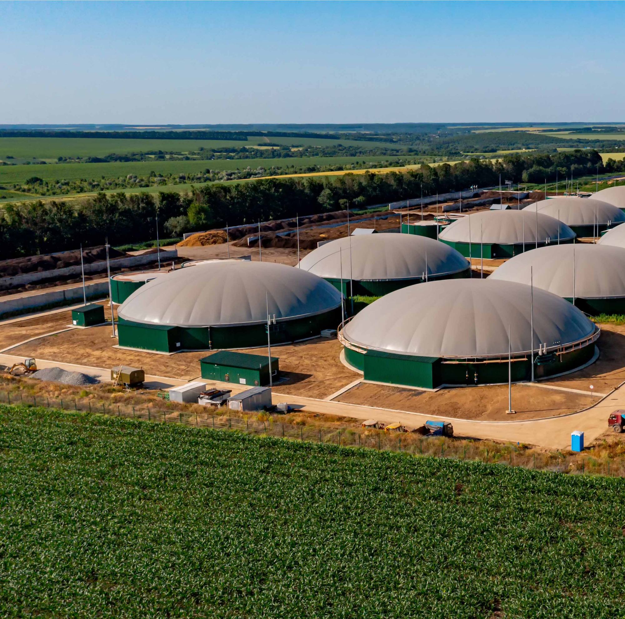 An aerial photo of tanks at a biogas factory.  