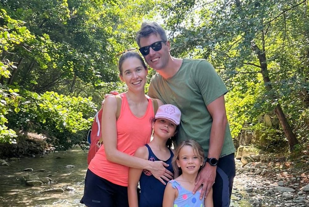 Katrien with her husband and two young daughters. 