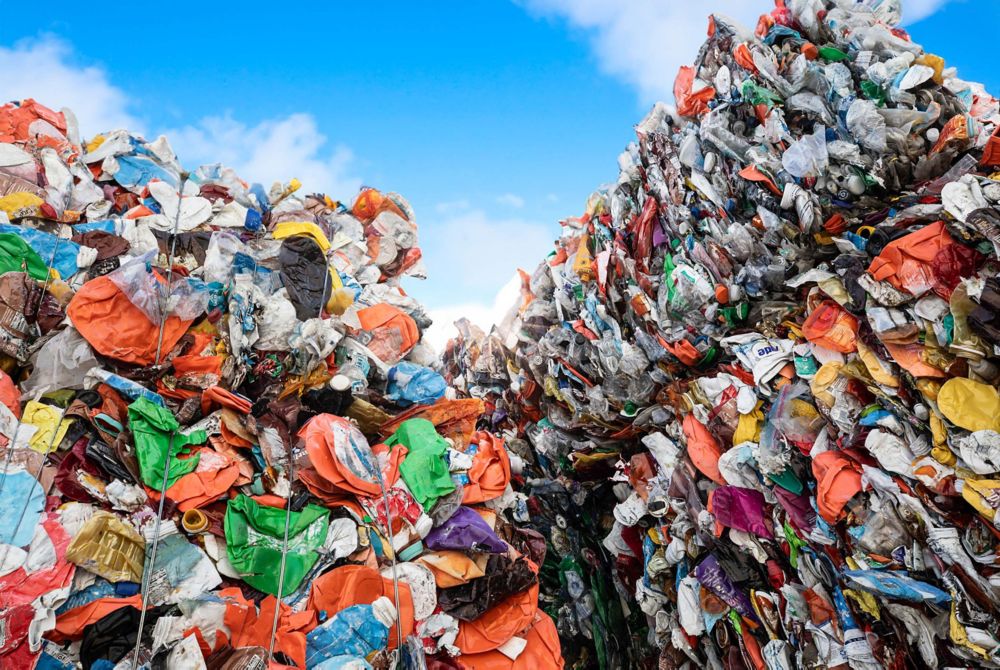  Bundles of colored and complex plastic are baled for molecular recycling at Eastman.  
