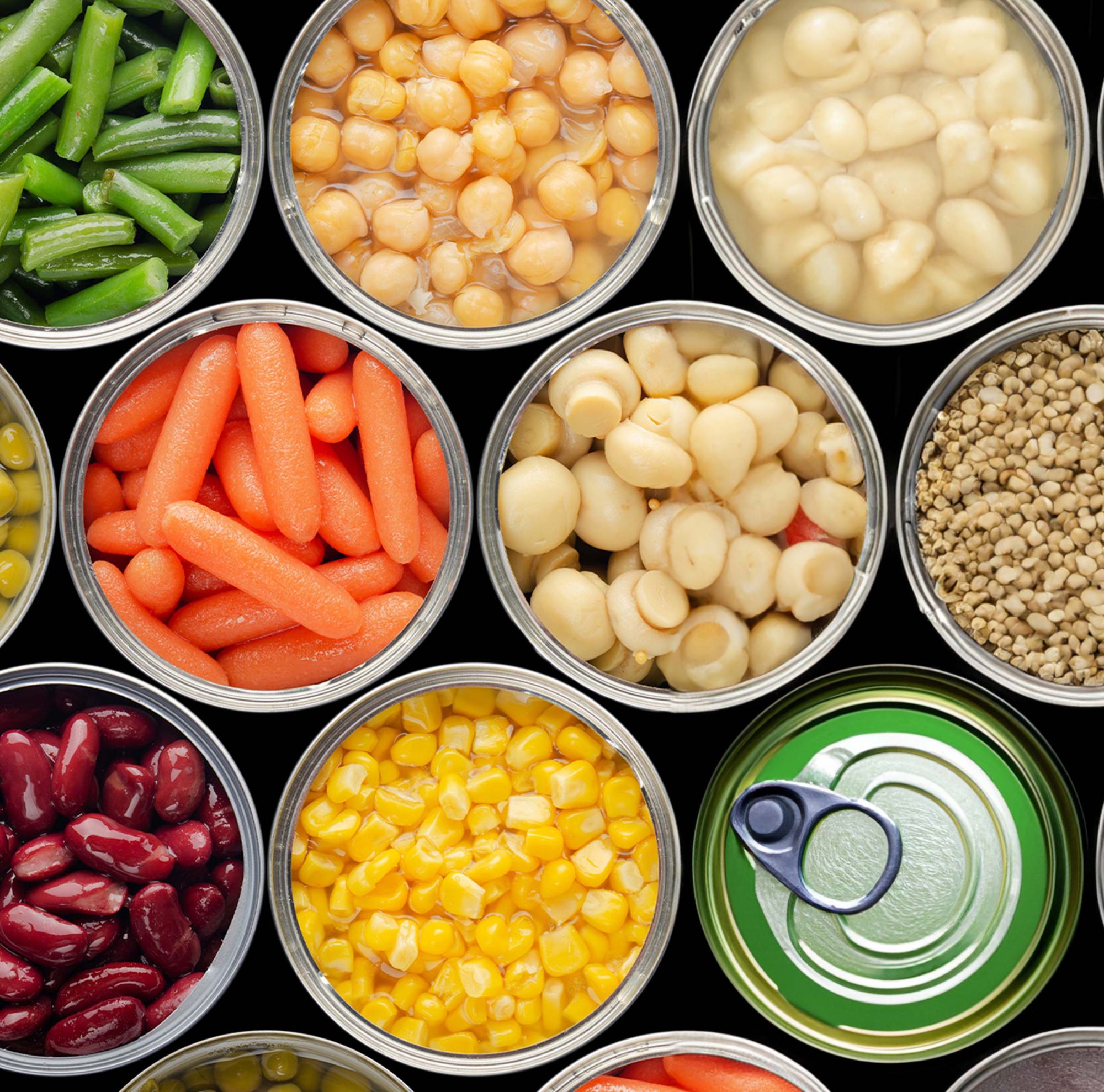 A variety of canned foods viewed from the top. 