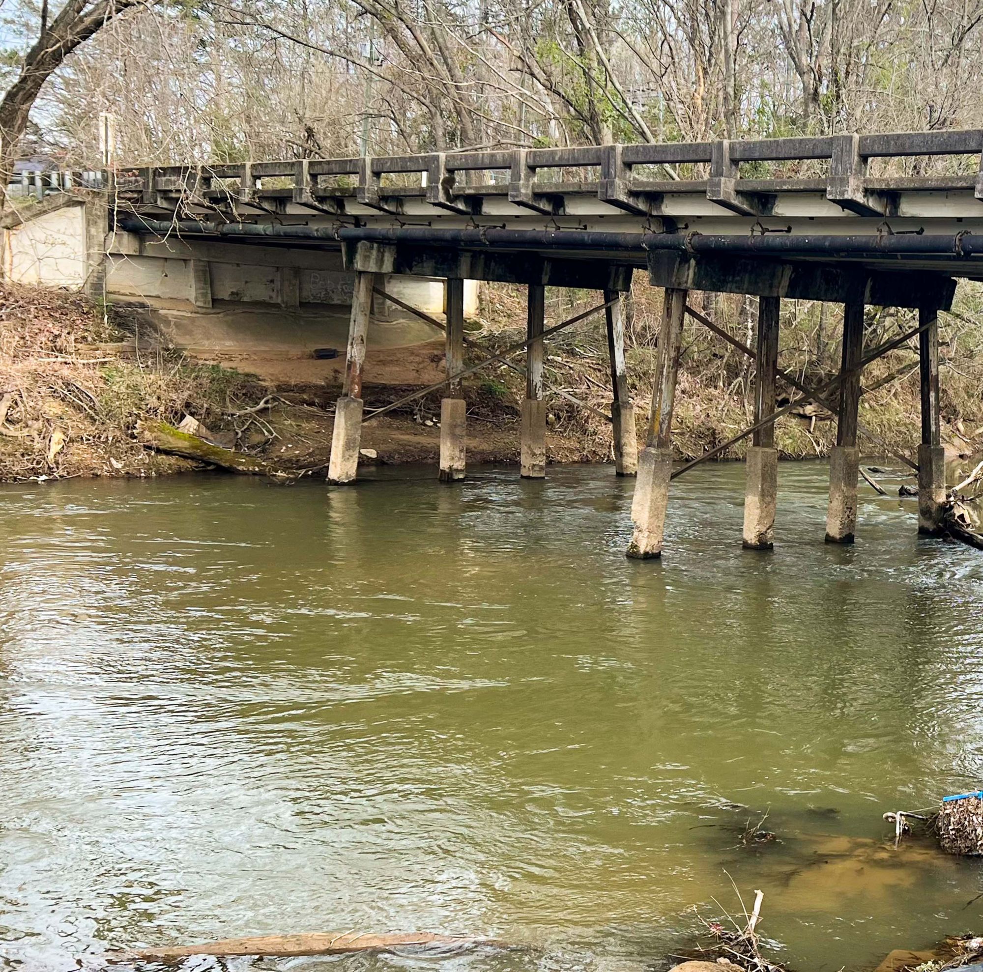 A bridge spans Choccolocco Creek.  