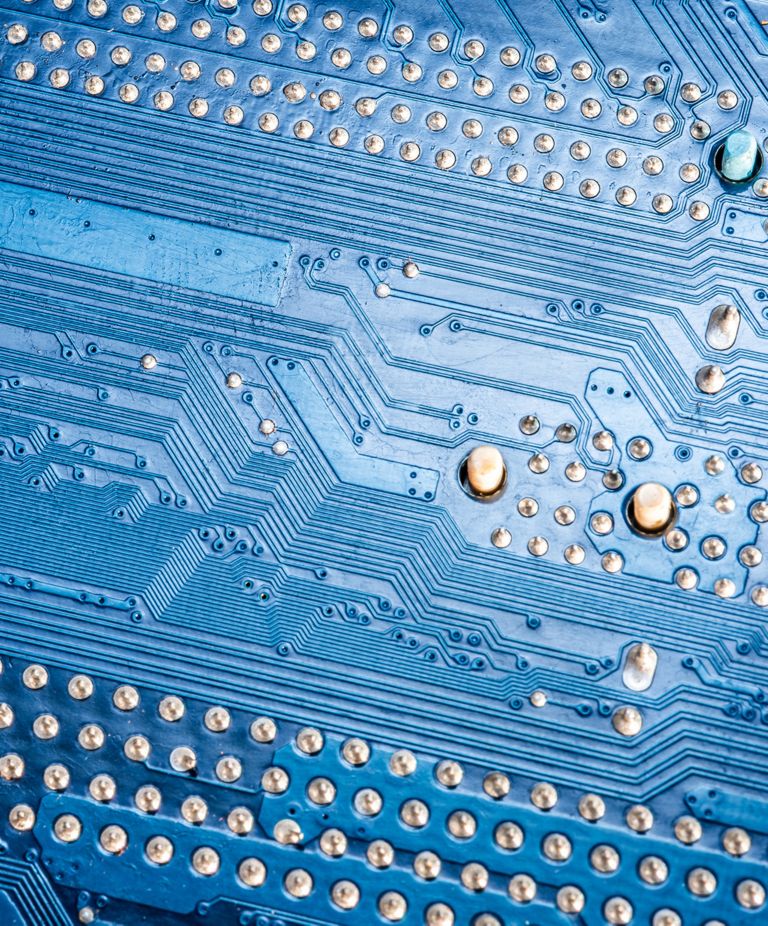 A blue circuit board is shown 