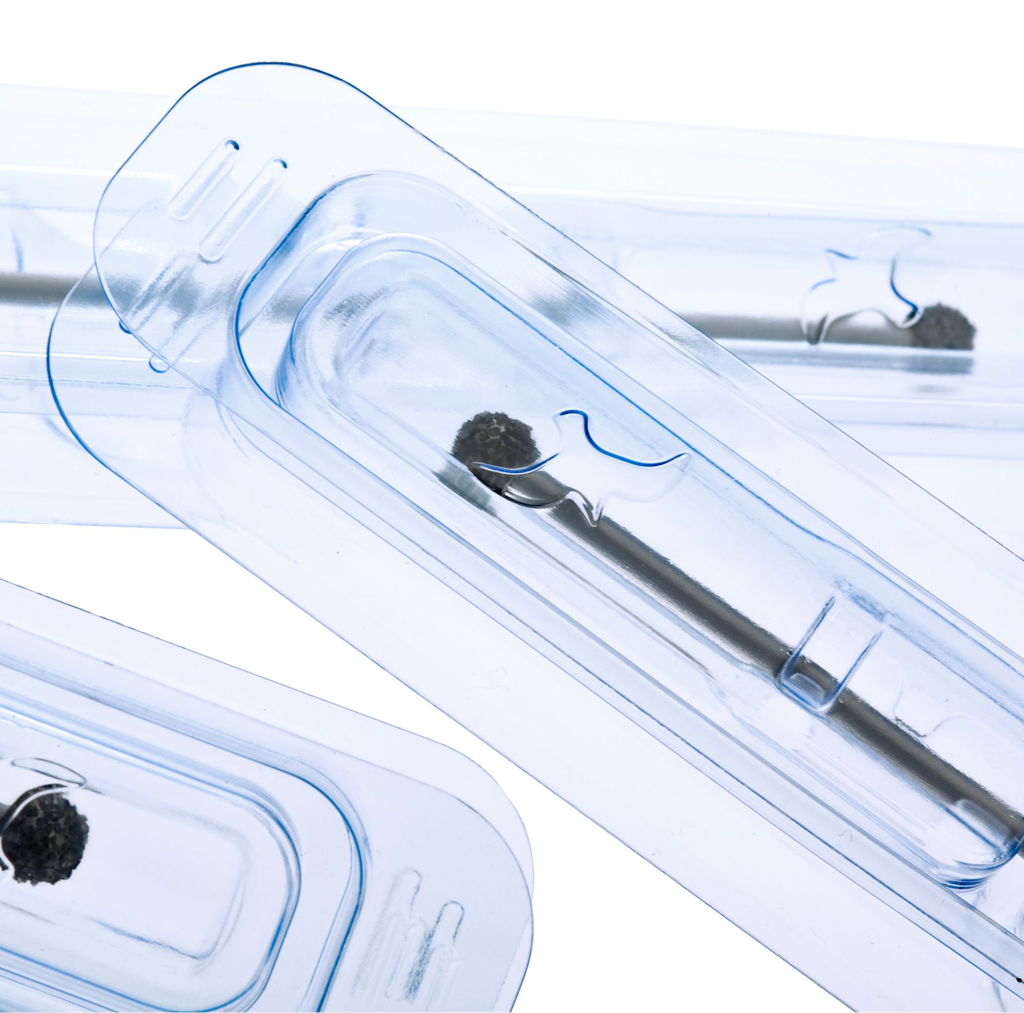 Clear plastic packaging with a black swab inside.   