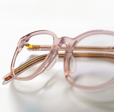 Close-up of a light-pink eyewear frame