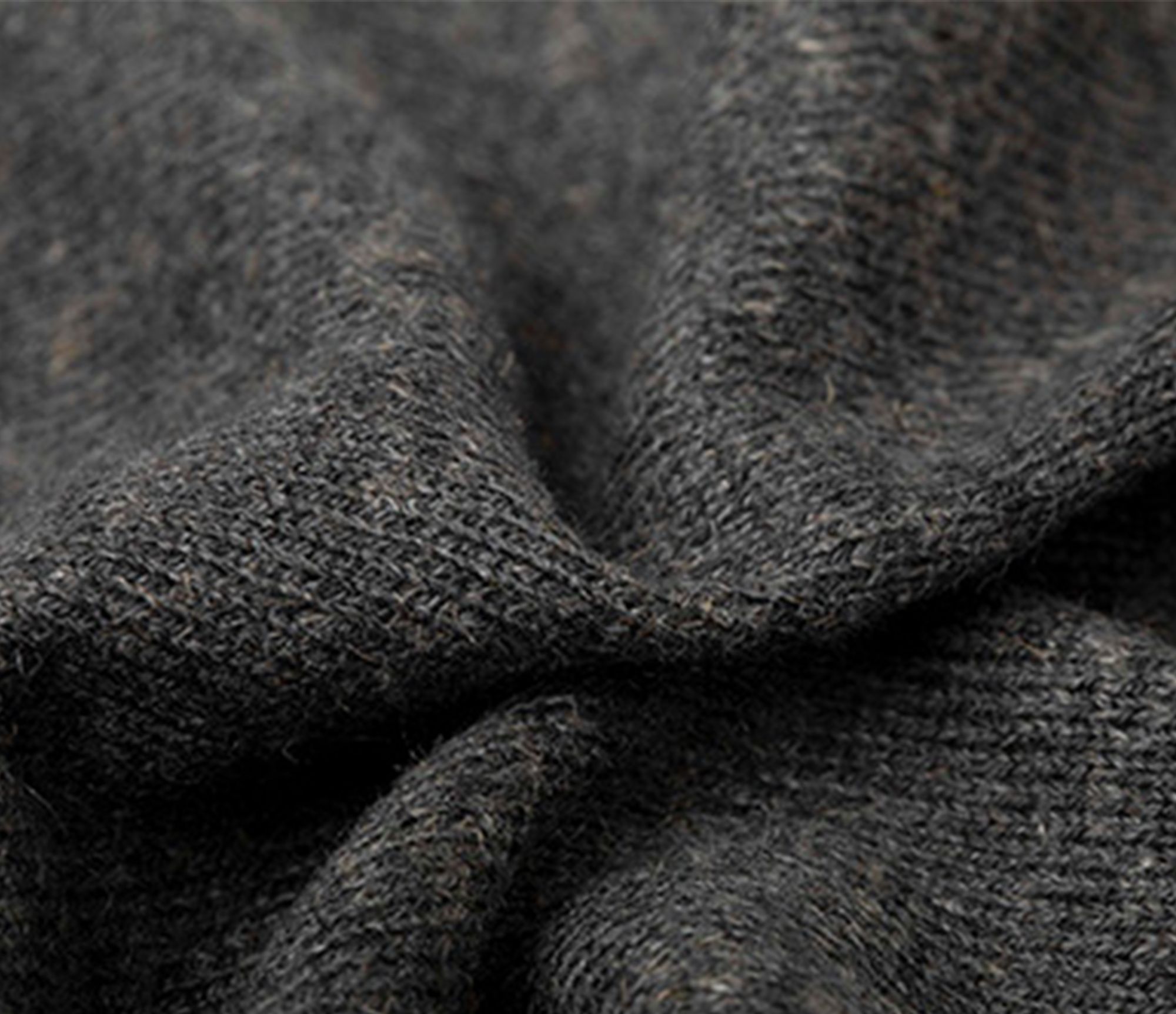 closeup black knit polyester sweater 