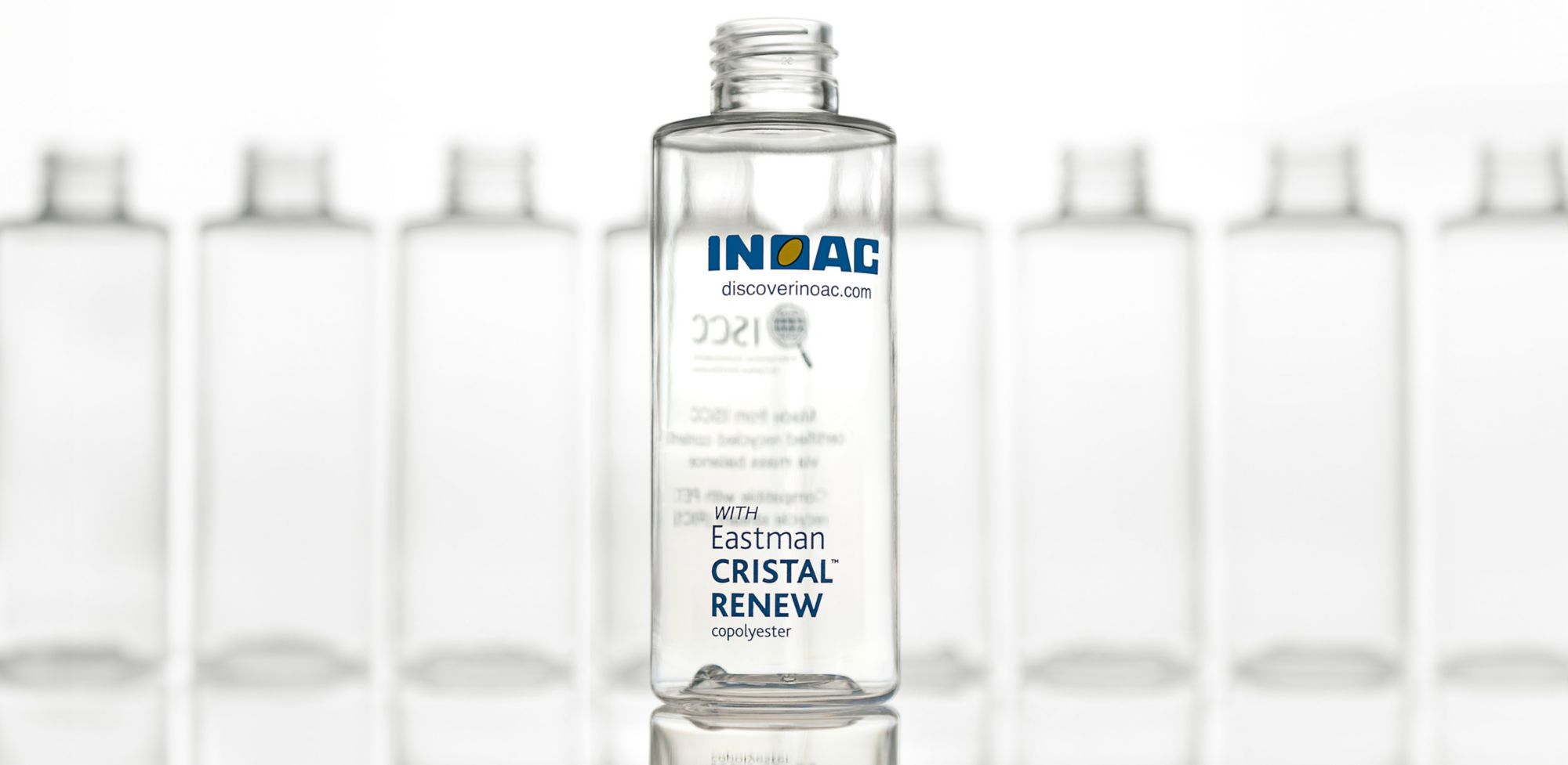 A line of clear, screw-top bottles made with Cristal 