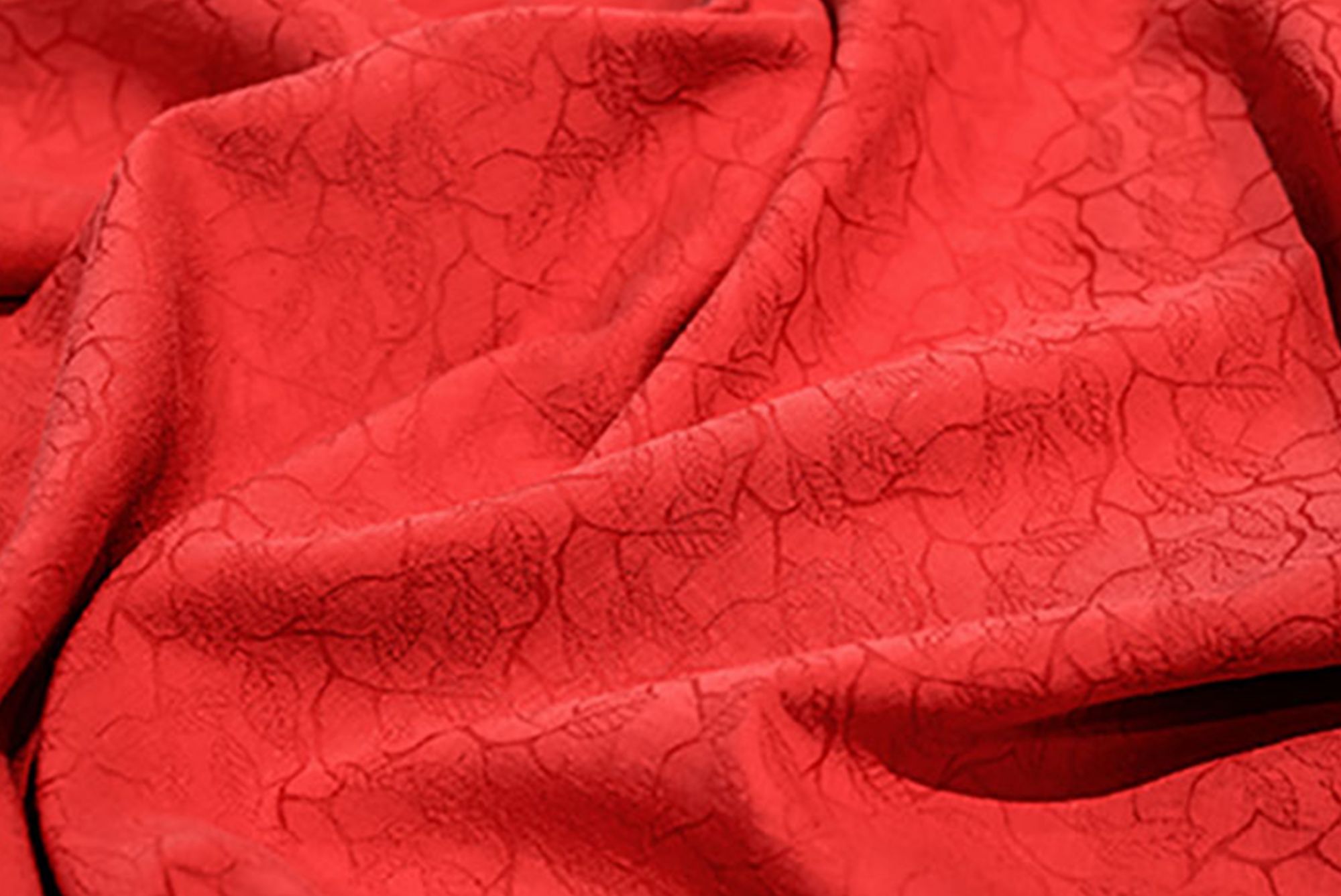 Closeup crimson patterned cloth 