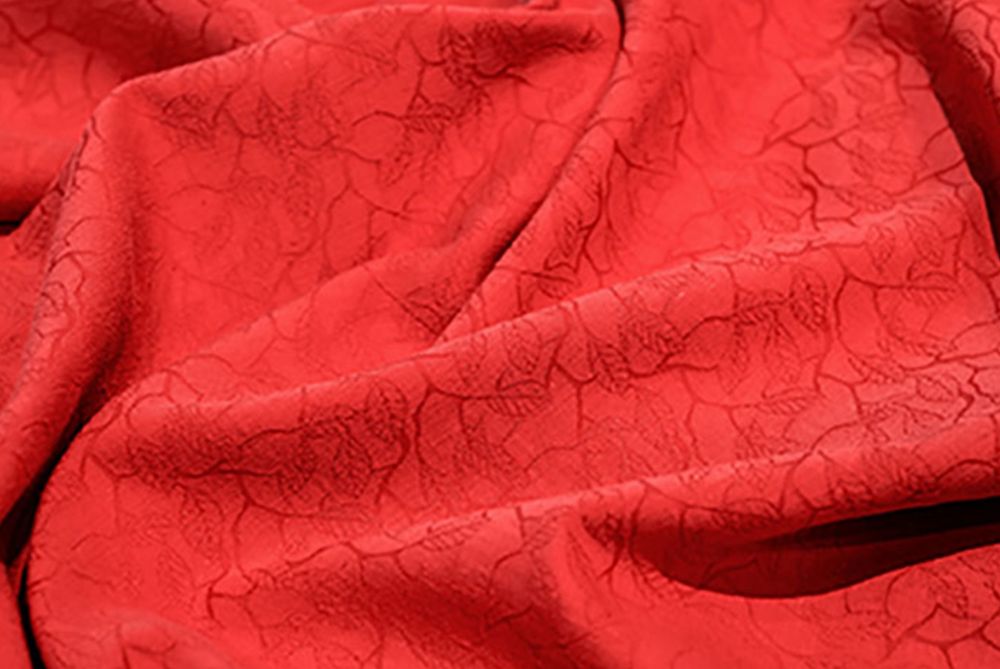 Closeup crimson patterned cloth 