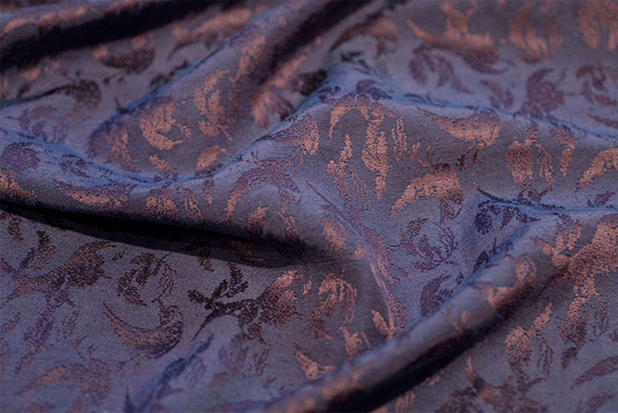 Closeup patterned purple satin cloth 