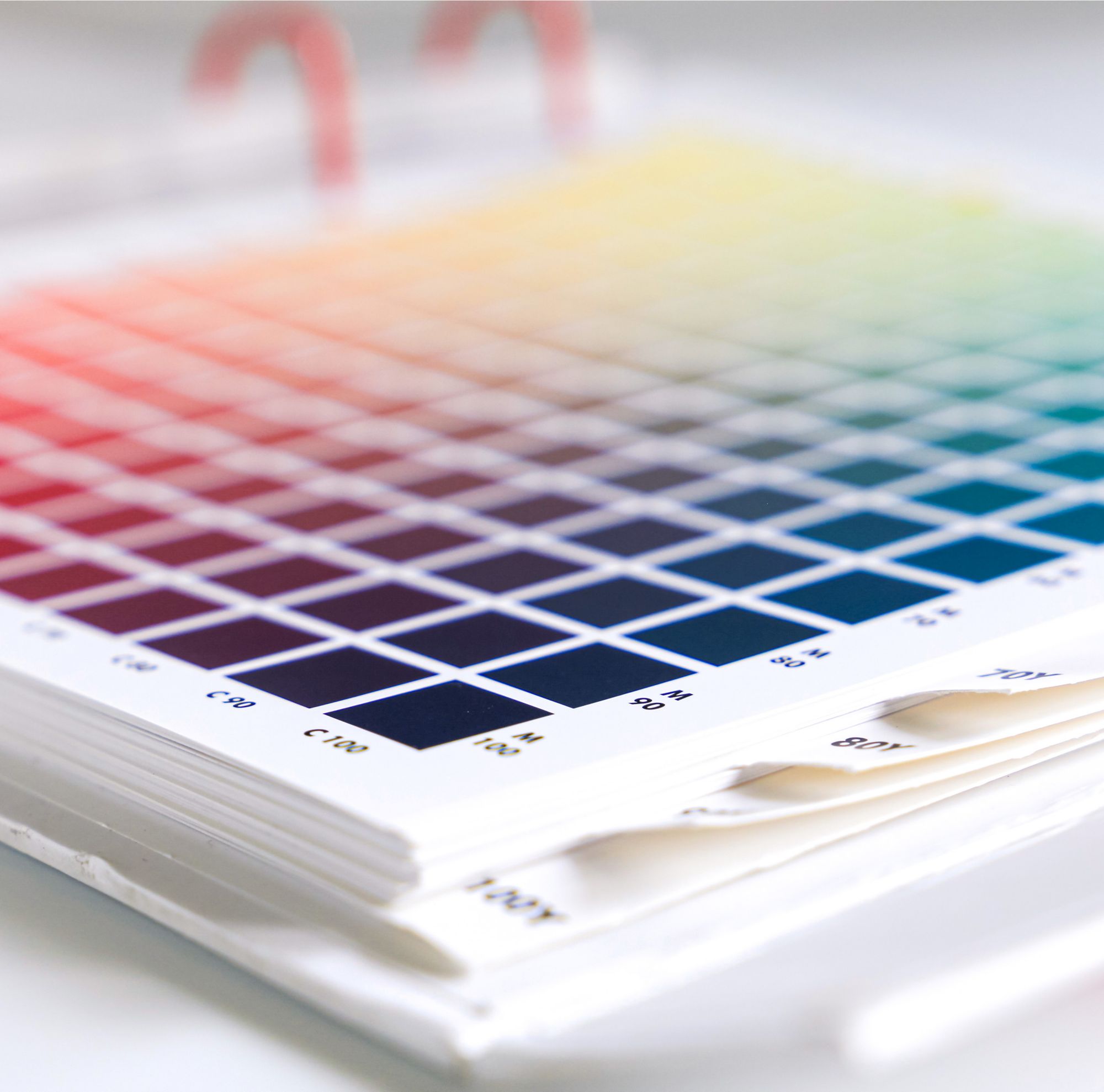 Close-up of a CMYK book for the printing process. 