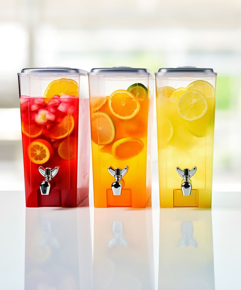 Three clear beverage dispensers made from Tritan. 