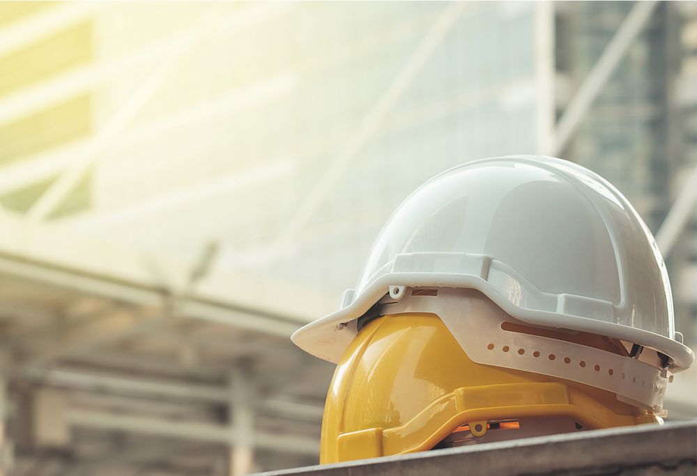 Two safety helmets stacked on top of each other.  