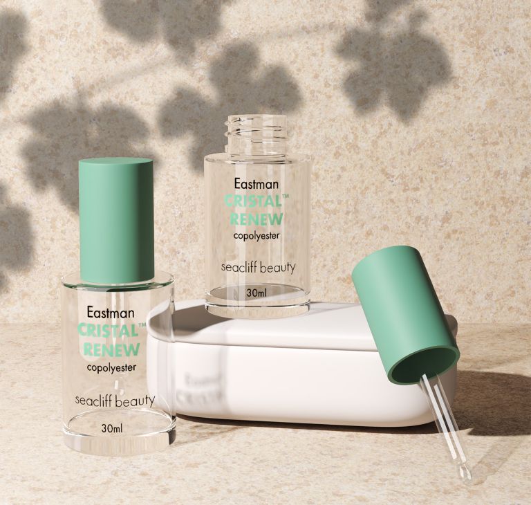 Two clear bottles with droppers made from Eastman Cristal Renew.  