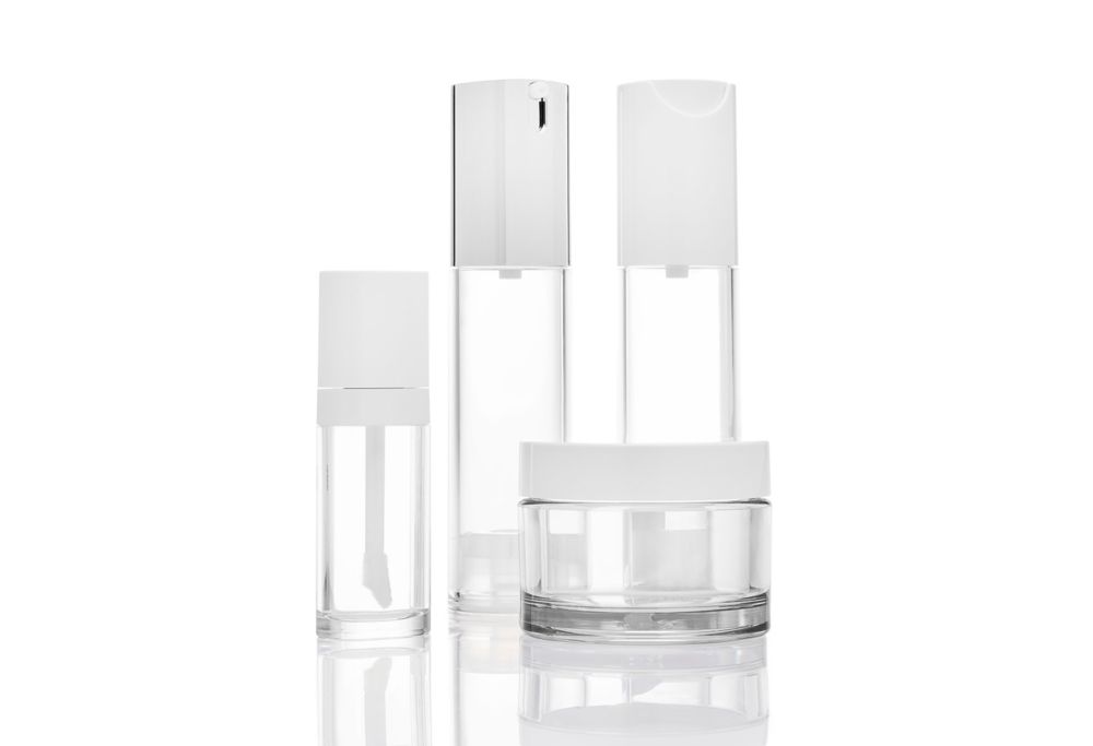 Clear cosmetic jar and bottles made from Eastman Cristal. 