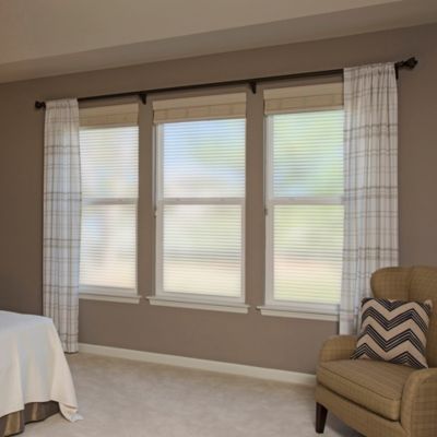 Interior view of Gila® Faux Blinds Decorative Window Film in bedroom