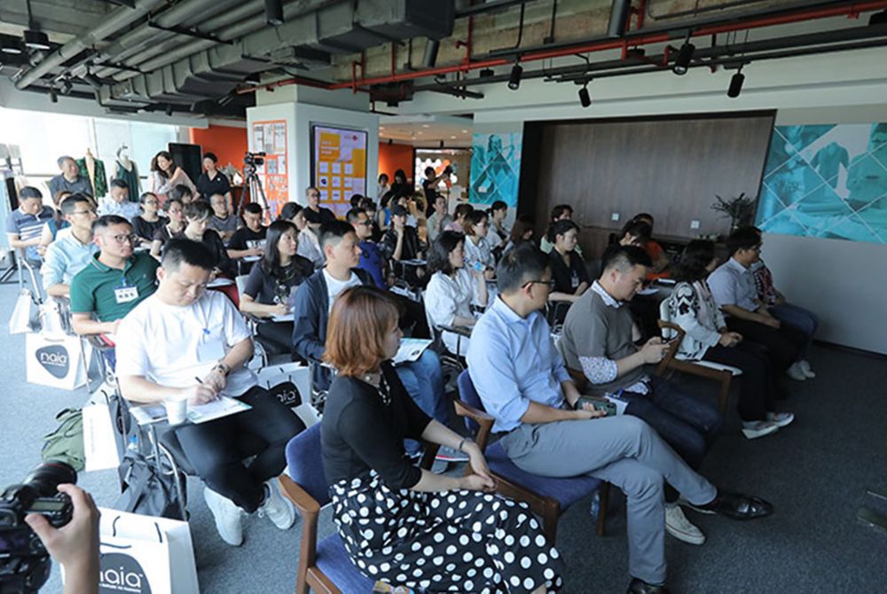 Designers at event sitting 