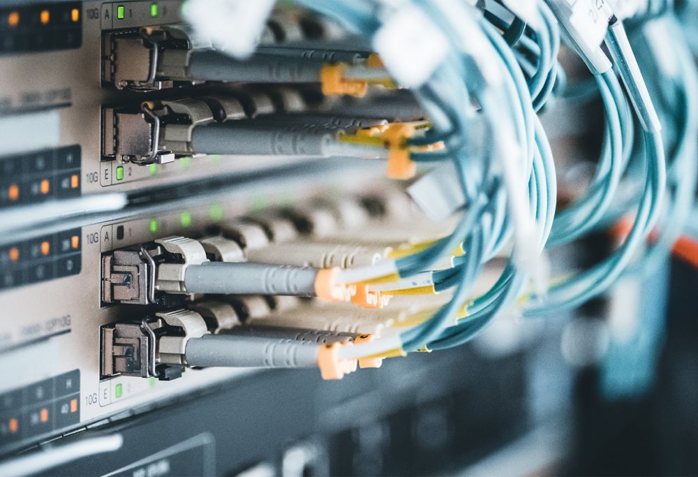 Close-up of cable wires coming out of an electronic device. 