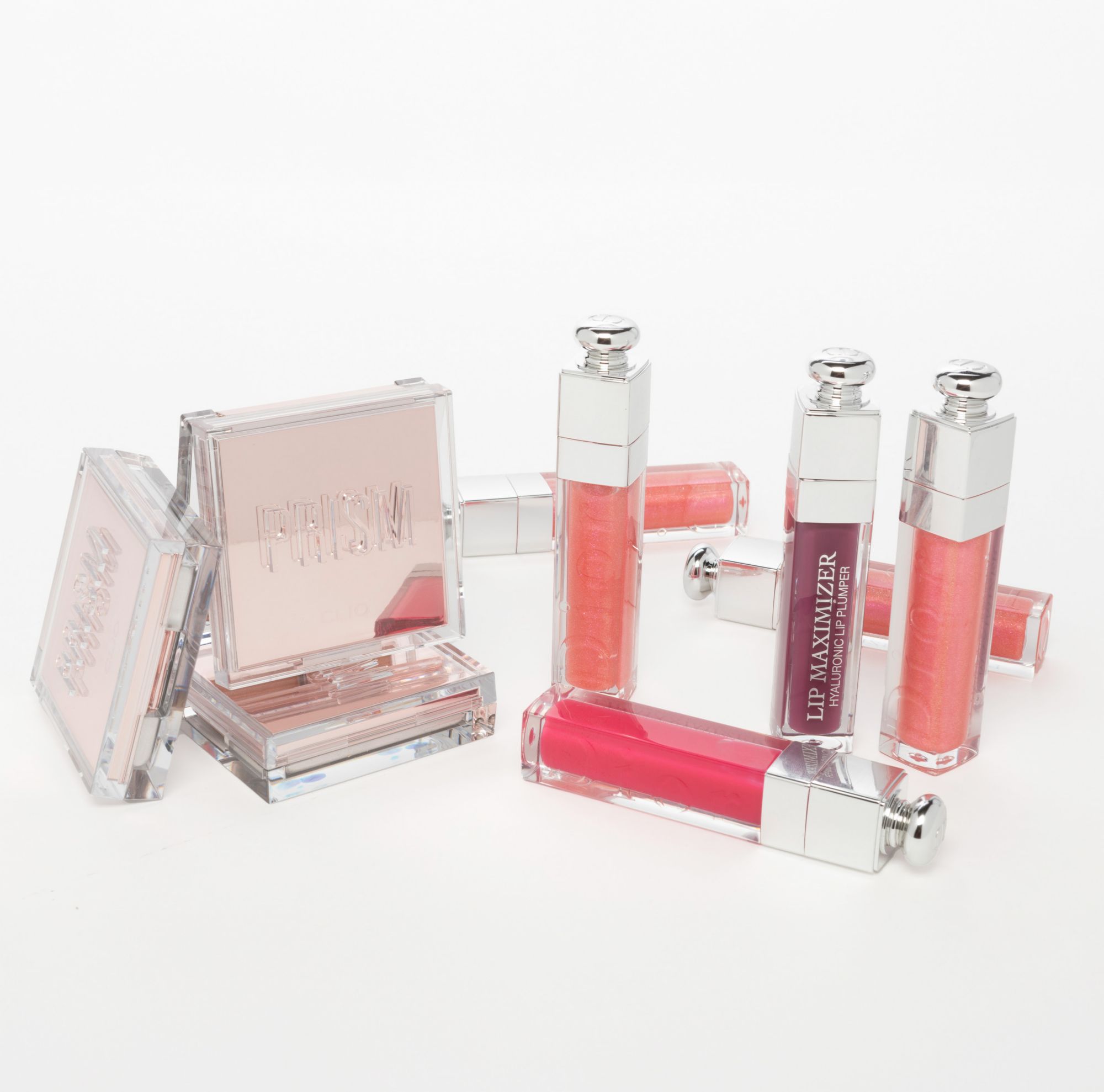 Clio Cosmetics Highlighter Duo compact and Dior Lip Maximizer packaging made from Eastman Cristal Renew. 