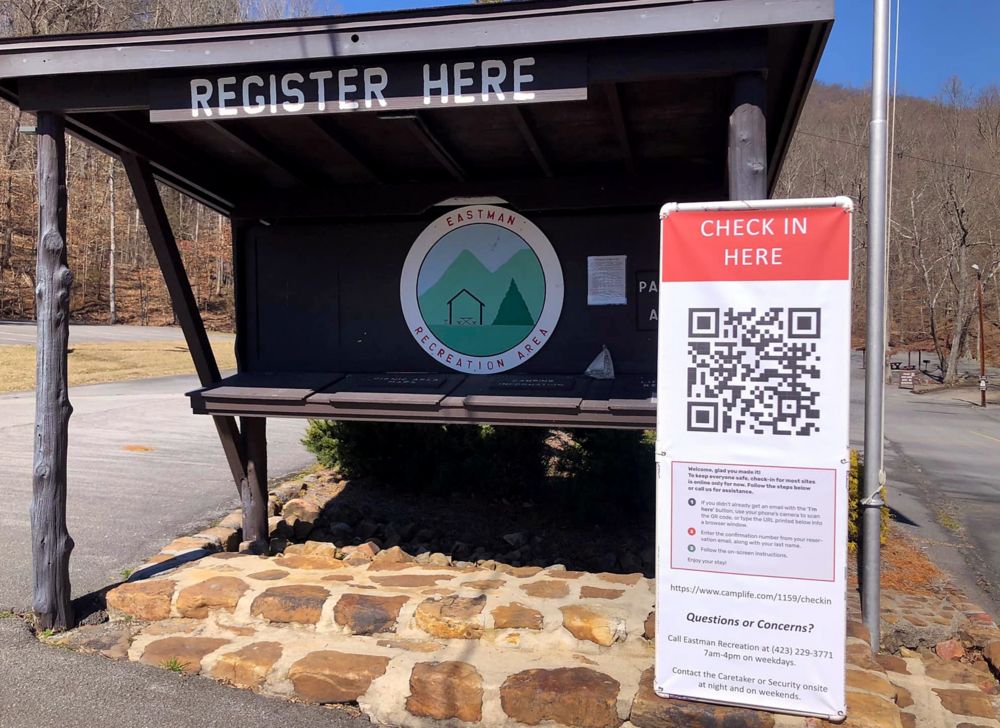 Registration shelter at the Eastman Recreation Center with a QR sign for check-in 