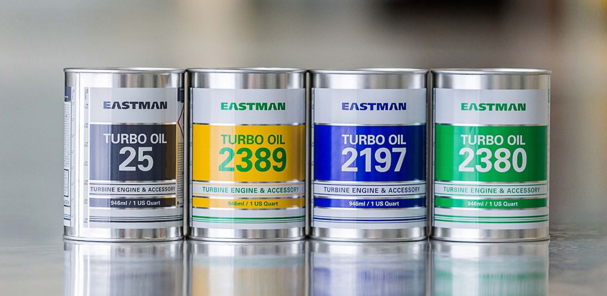 Cans of Eastman turbo oils are lined up.  