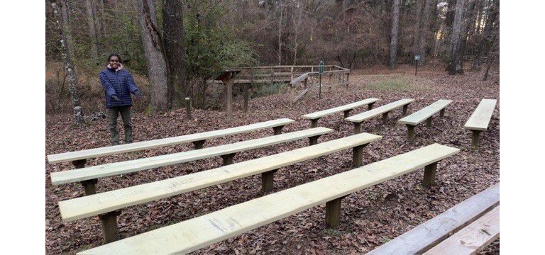 Members of a local scout troop work on a project 