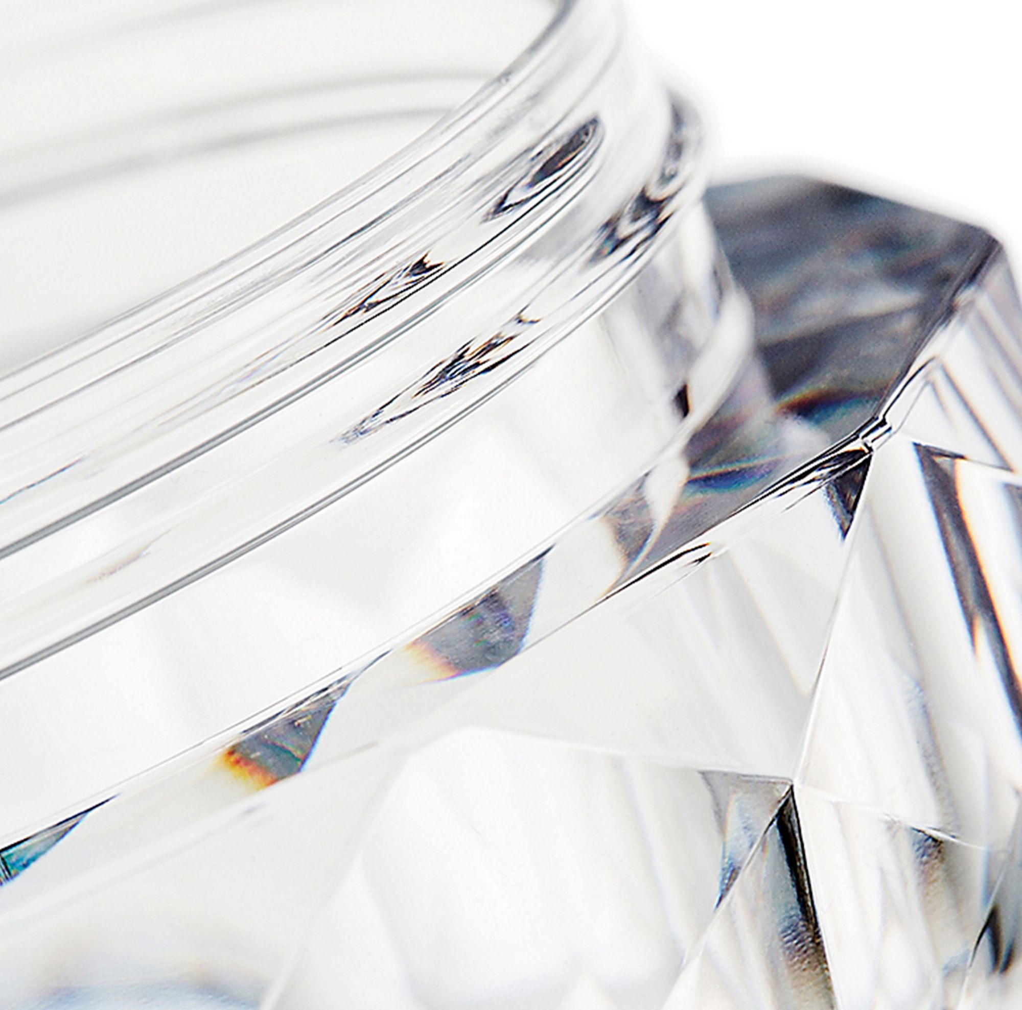 Close up of faceted glass-like jar made from Eastman Cristal copolyester. 