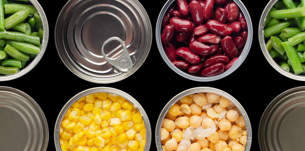 Two rows of metal cans are shown from above, with some open and some closed 