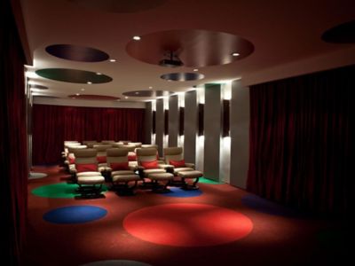 room with red walls and sitting places