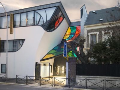 school building in France with colorful glass facade