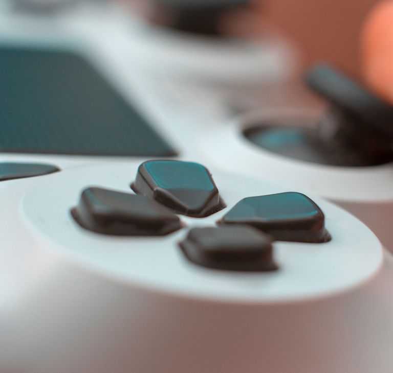 Close-up of buttons on a game controller. 