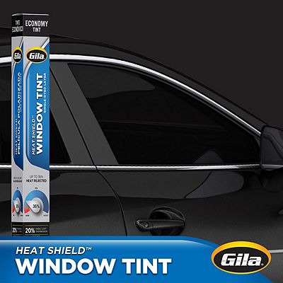 Gila Heat Shield 20% VLT Window Tint packaging in front of car