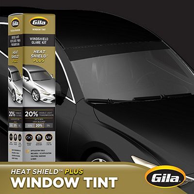 Gila® Static Cling 5% VLT Window Tint packaging in front of car