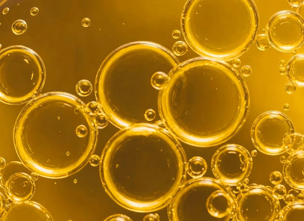 Bubbles in yellow heat transfer fluid. 