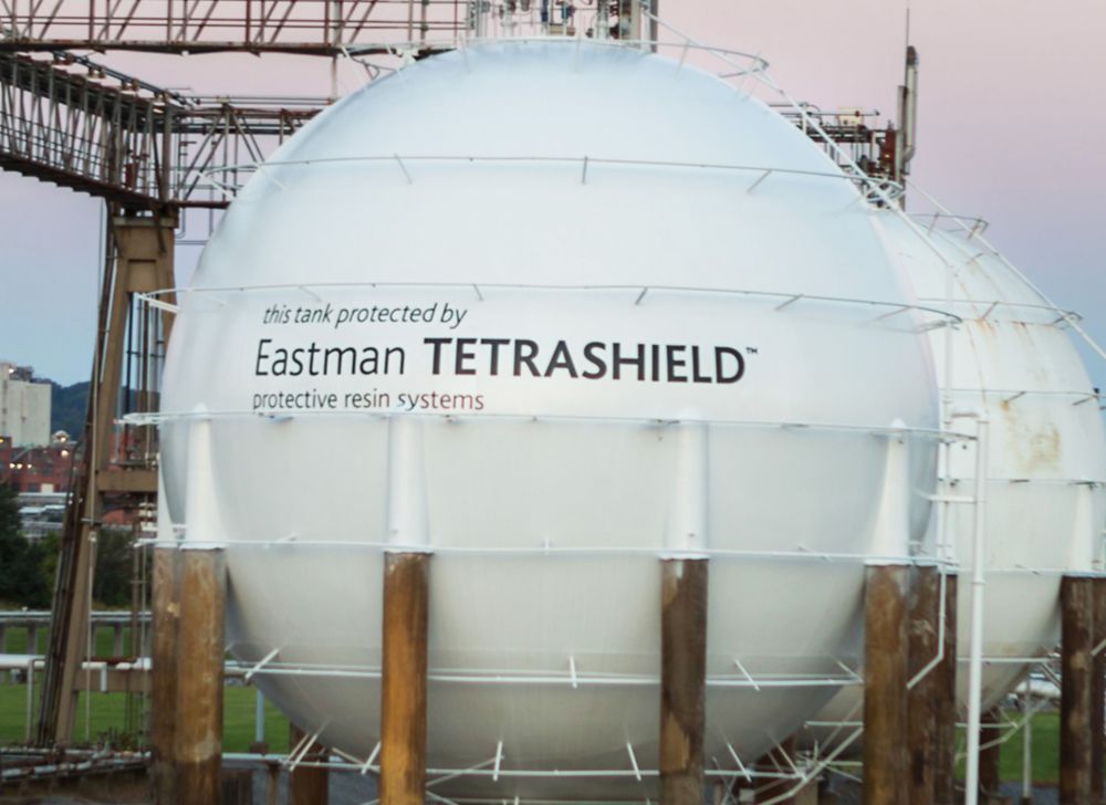An industrial holding tank is labeled that it’s protected by Tetrashield. 