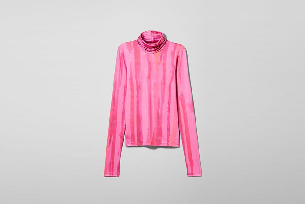 Isolated long-sleeved turtleneck pink shirt Weekday made with 100% Naia™ 