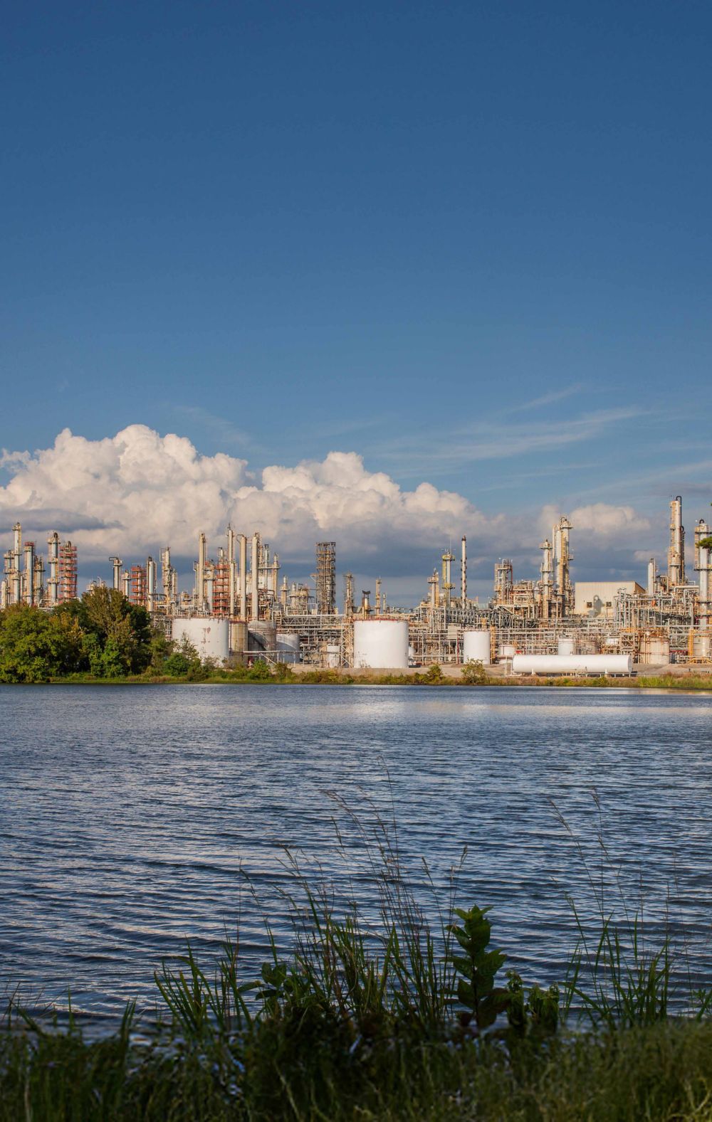 Landscape view of the Eastman manufacturing facility in Longview, Texas, near the river.  