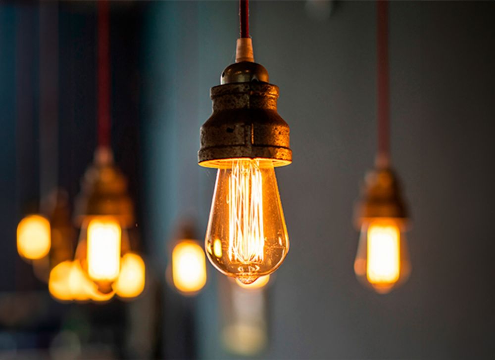 Lights hang from a ceiling. 