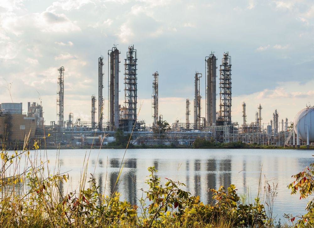 Eastman’s Longview, Texas, facility in the background beyond a river 