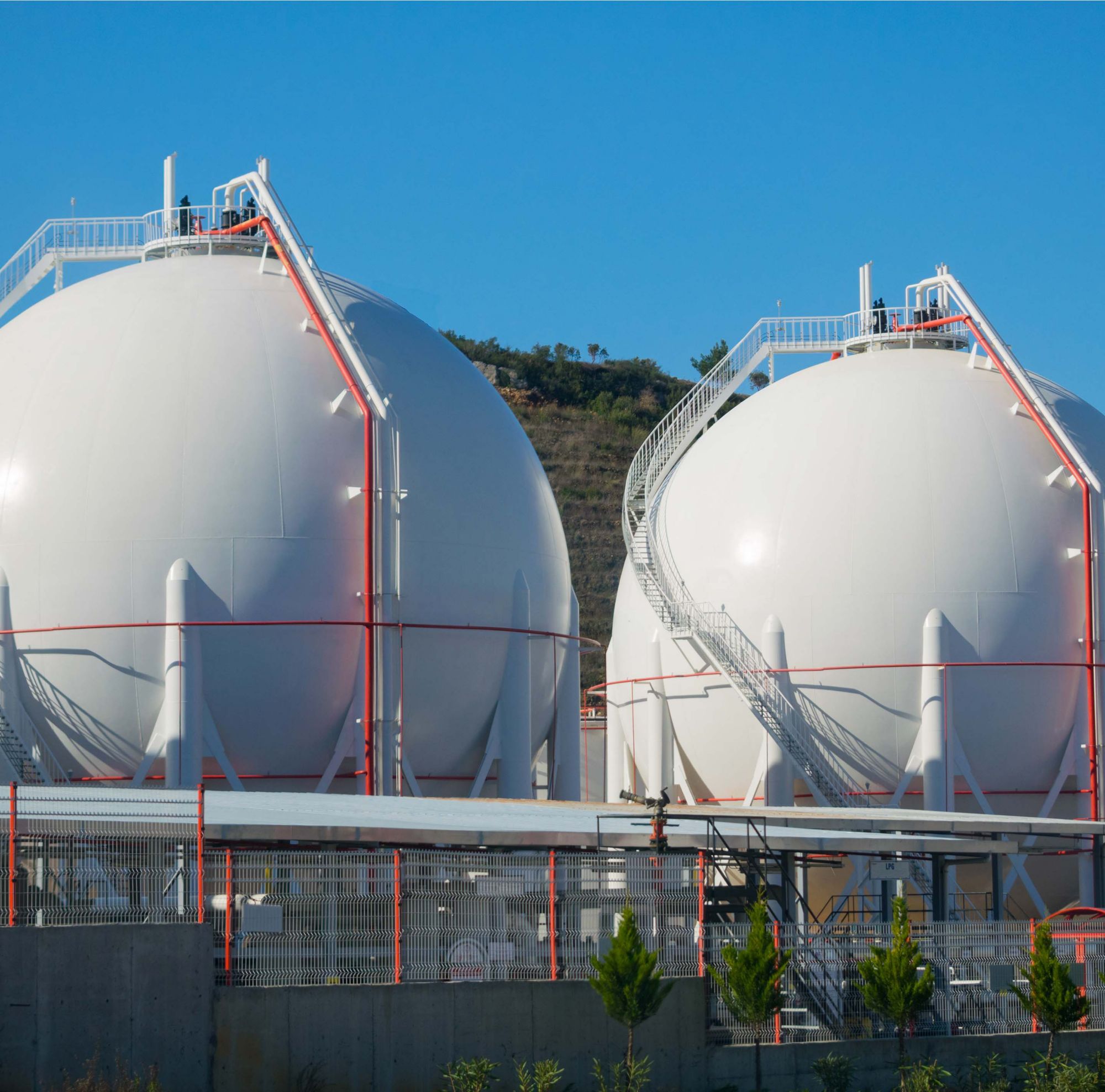 An exterior photo of winding pipe in an oil refinery heat exchanger.  