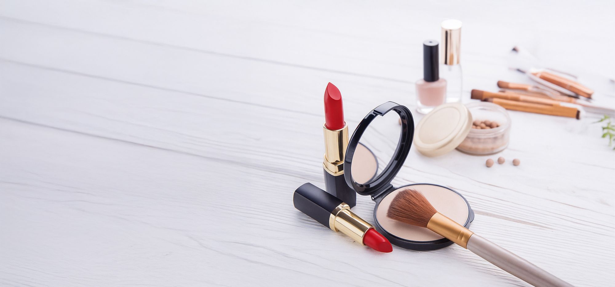 A glamor portrait of a person with curly hair. 