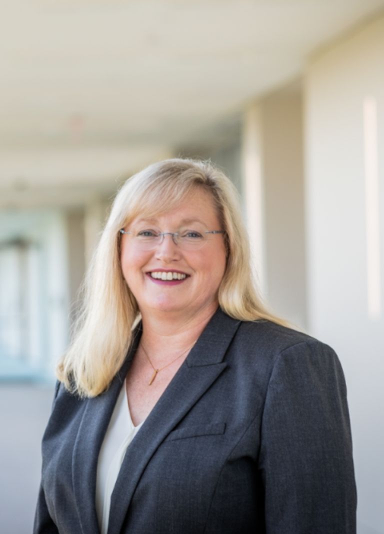 Julie A. McAlindon, Senior Vice President, Supply Chain, Regions and Transformation. 