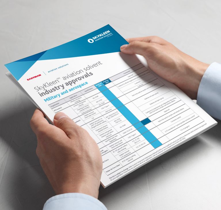 A person holds a list of SkyKleen aviation solvent industry approvals. 