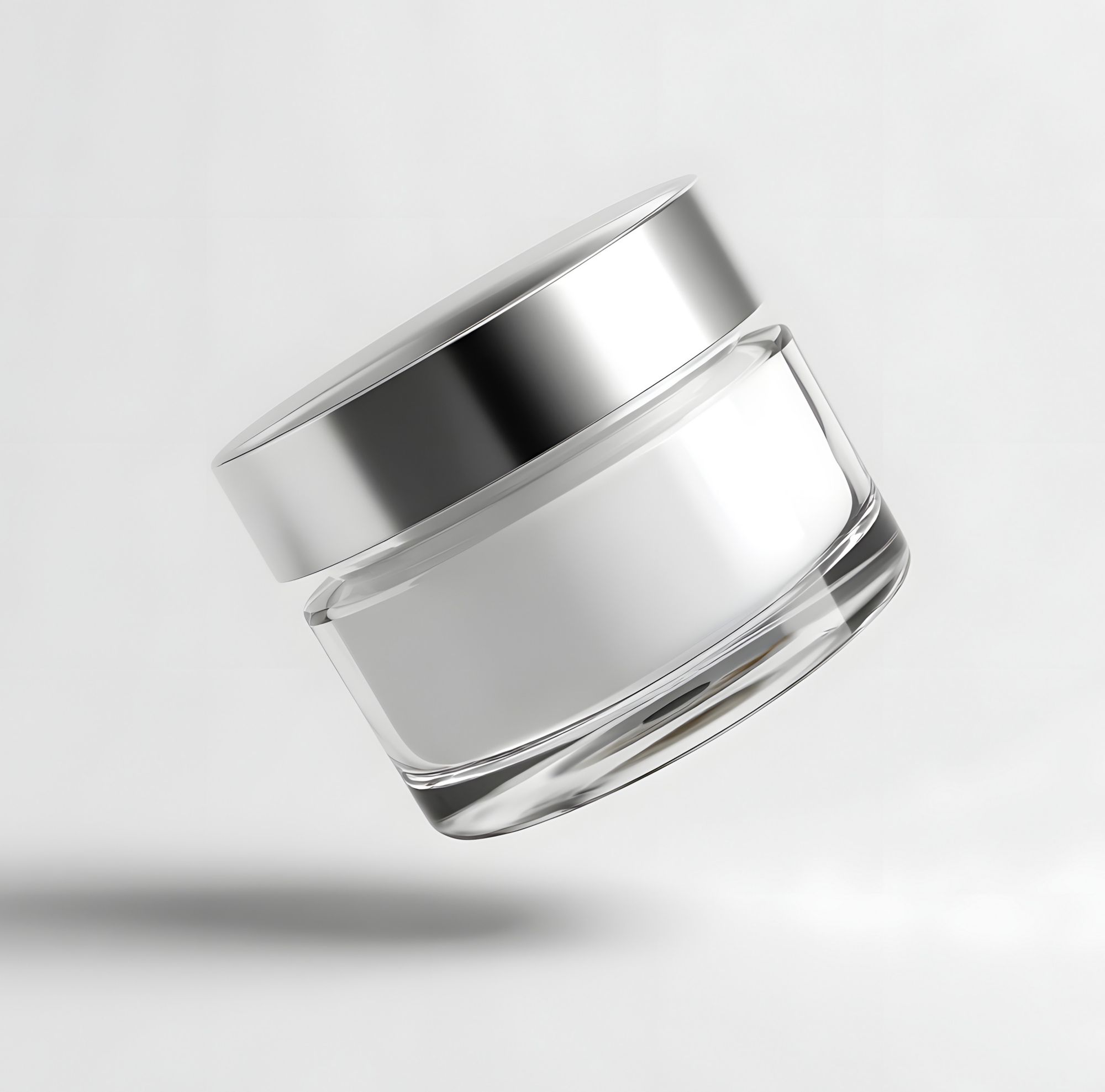 Tilted white cosmetic jar filled with cream. 
